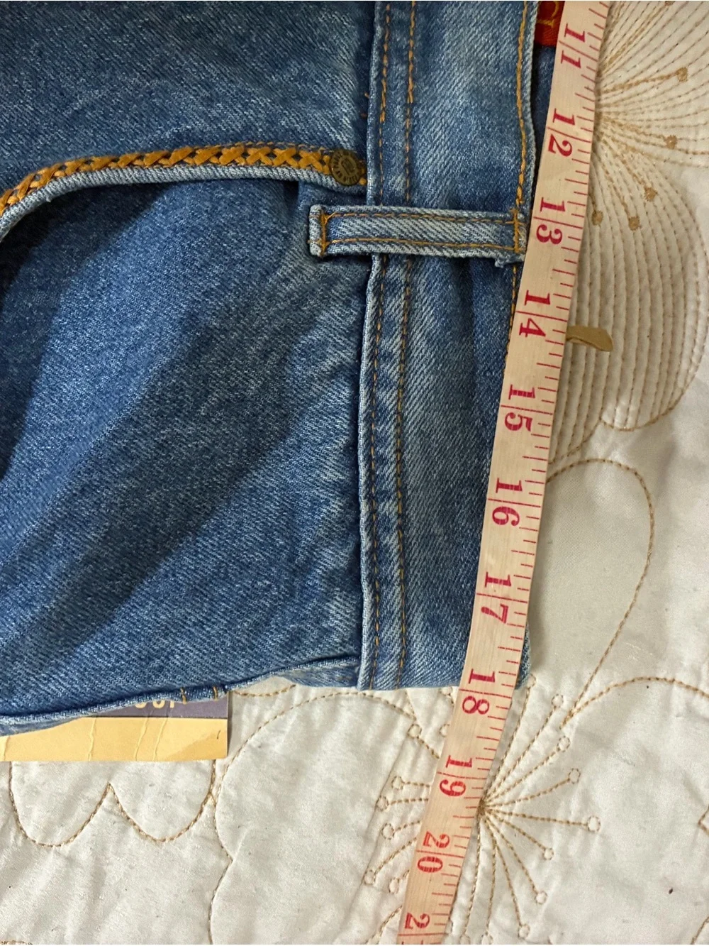 Relaxed Light Blue Men's Jeans with Embroidered Pocket Detail